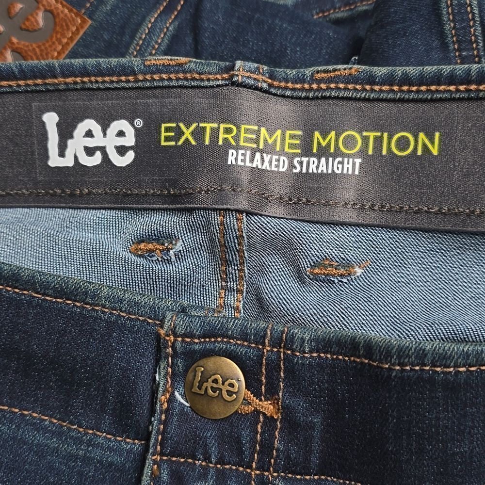 665 NWT Men's Extreme Motion Relaxed Straight Jean Size 46x32  Dark Convoy - Picture 6 of 8